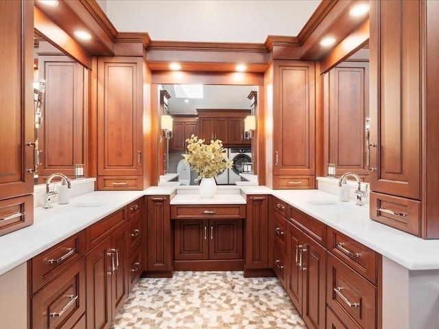 bathroom with vanity and independent washer and dryer