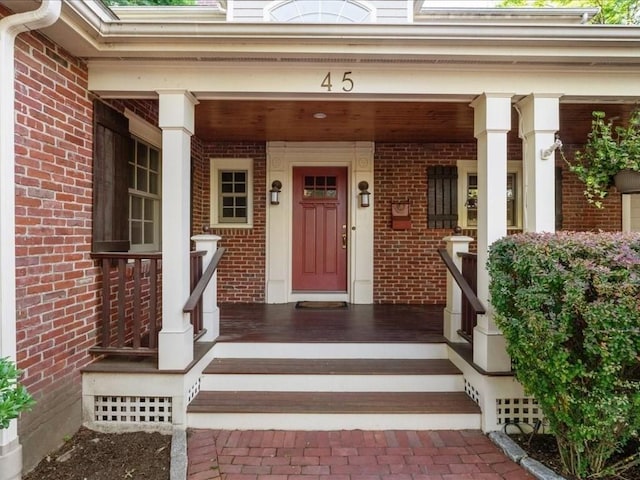 property entrance featuring a porch