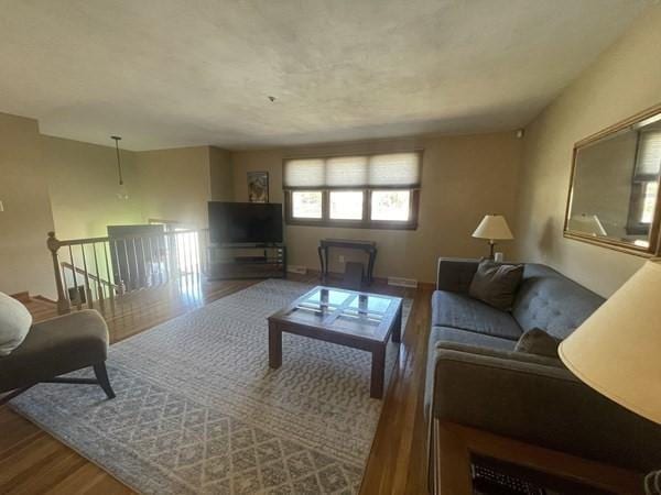 living area with wood finished floors