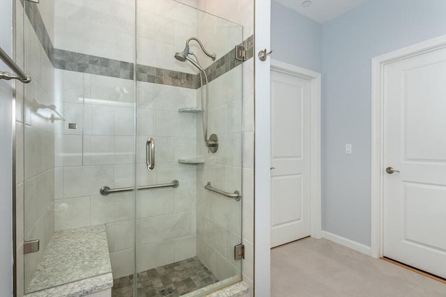 1 Revolution Way Unit 108, Canton, MA 02021 - bathroom featuring a shower stall and baseboards