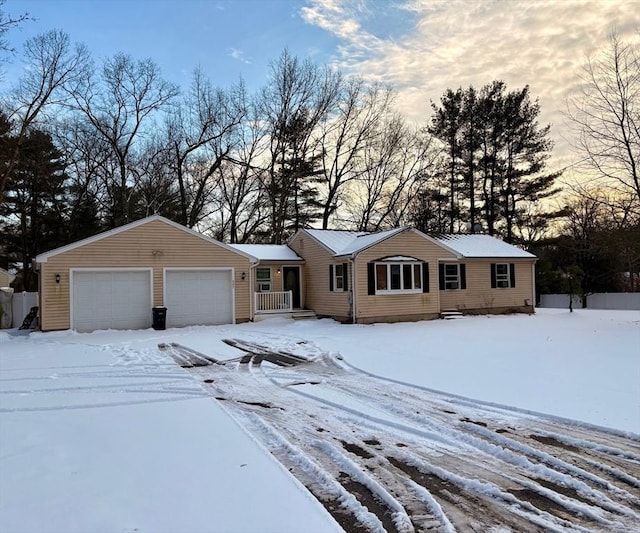 single story home featuring a garage