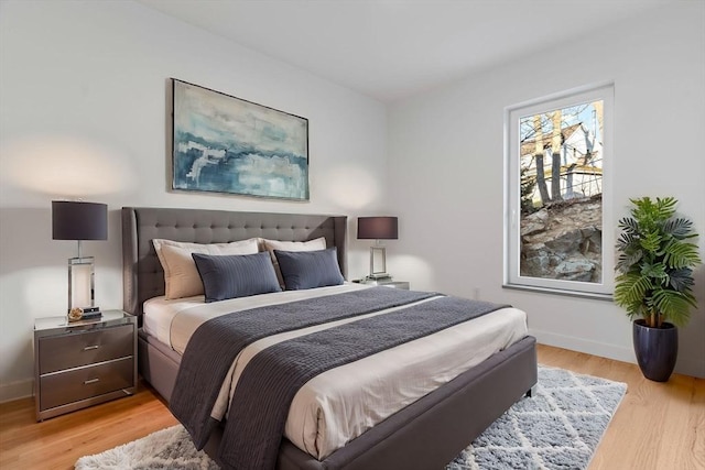 bedroom featuring light wood-type flooring