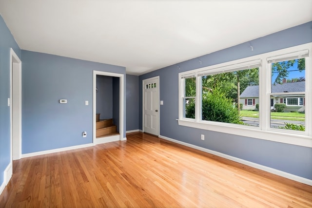 unfurnished bedroom featuring hardwood / wood-style flooring