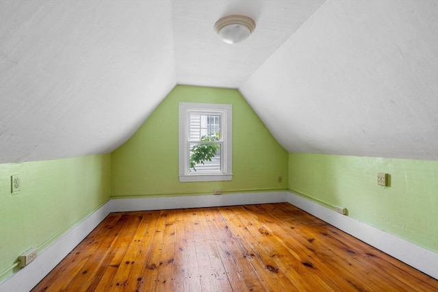 21 Chapel St Unit 21, Newburyport, MA 01950 - additional living space featuring hardwood / wood-style floors and vaulted ceiling