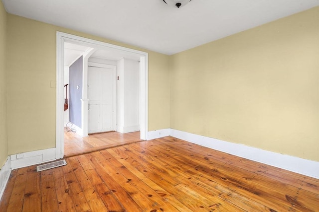 21 Chapel St Unit 21, Newburyport, MA 01950 - spare room featuring baseboards and hardwood / wood-style flooring