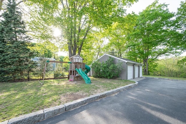 272 County St, Seekonk, MA 02771 - view of jungle gym featuring an outbuilding and view of wooded area