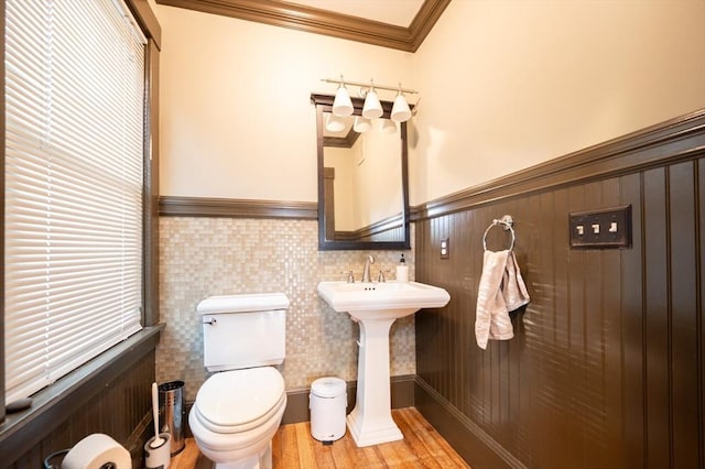 272 County St, Seekonk, MA 02771 - bathroom featuring crown molding, wainscoting, toilet, wood finished floors, and a sink
