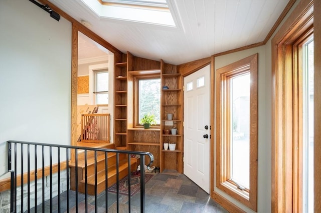 272 County St, Seekonk, MA 02771 - entryway featuring dark stone finish floors, crown molding, vaulted ceiling, and built in shelves