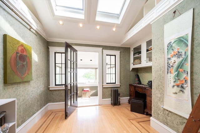 272 County St, Seekonk, MA 02771 - doorway featuring radiator heating unit, recessed lighting, wood finished floors, a skylight, and ornamental molding