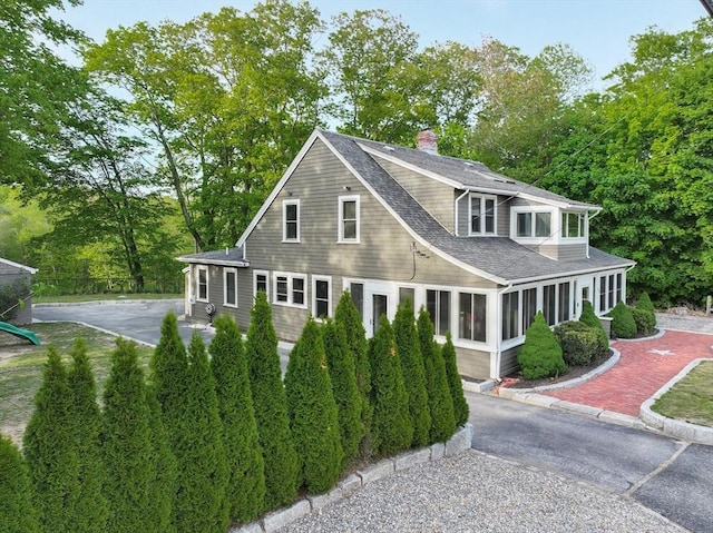 272 County St, Seekonk, MA 02771 - view of front of home with a chimney, roof with shingles, and driveway