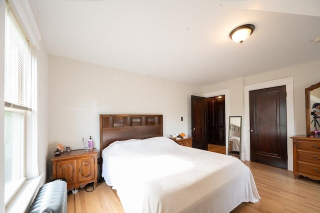 272 County St, Seekonk, MA 02771 - bedroom with radiator and light wood-style floors