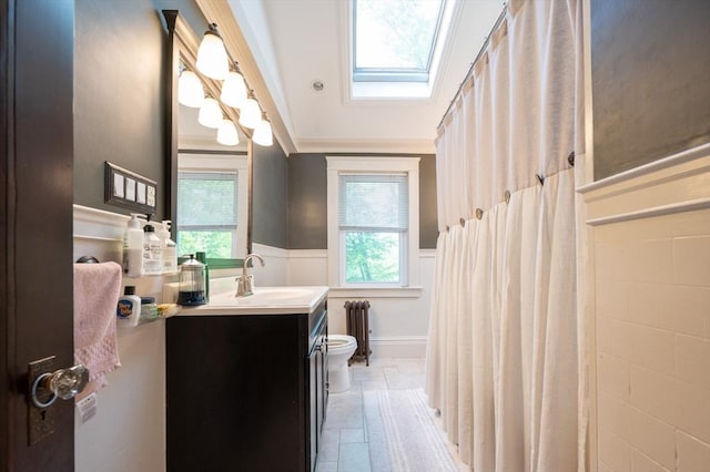 272 County St, Seekonk, MA 02771 - bathroom with radiator, toilet, a wainscoted wall, vanity, and crown molding