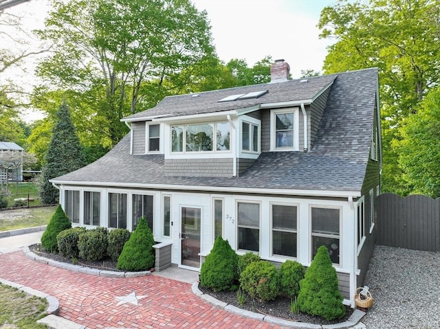 272 County St, Seekonk, MA 02771 - view of front of home featuring roof with shingles, a chimney, a gate, and fence