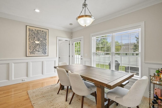 80 Edgemere Ave Unit 80, Northbridge, MA 01588 - dining room featuring a decorative wall, light wood finished floors, crown molding, and a wainscoted wall