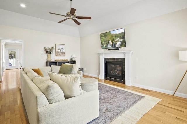 80 Edgemere Ave Unit 80, Northbridge, MA 01588 - living room featuring wood finished floors, ceiling fan, a premium fireplace, and lofted ceiling