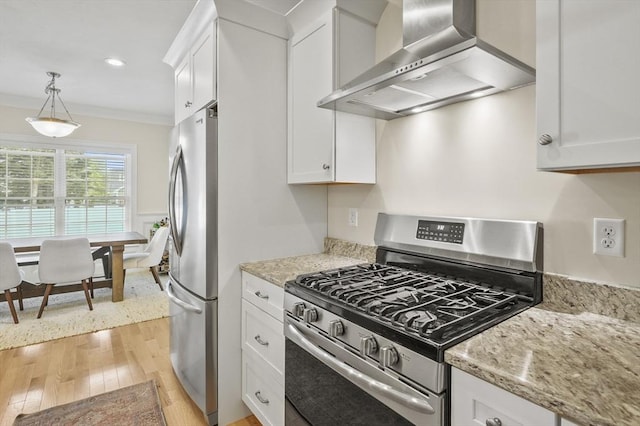 80 Edgemere Ave Unit 80, Northbridge, MA 01588 - kitchen with appliances with stainless steel finishes, wall chimney range hood, light wood-style floors, white cabinets, and ornamental molding