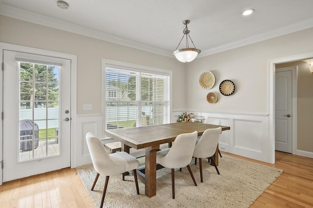 80 Edgemere Ave Unit 80, Northbridge, MA 01588 - dining room with crown molding, light wood-style floors, wainscoting, a decorative wall, and recessed lighting