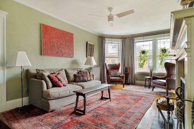 3 Newport Rd Unit 8, Cambridge, MA 02140 - living area featuring wood finished floors, a ceiling fan, crown molding, and a fireplace