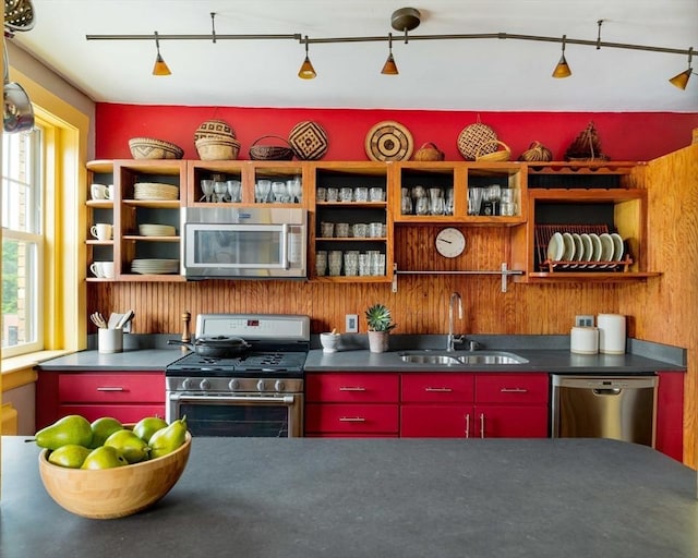 3 Newport Rd Unit 8, Cambridge, MA 02140 - kitchen featuring stainless steel appliances, red cabinets, open shelves, and healthy amount of natural light