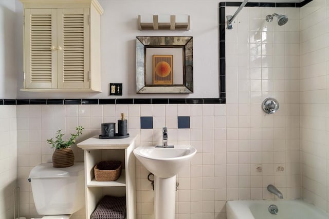 3 Newport Rd Unit 8, Cambridge, MA 02140 - bathroom featuring tub / shower combination and tile walls