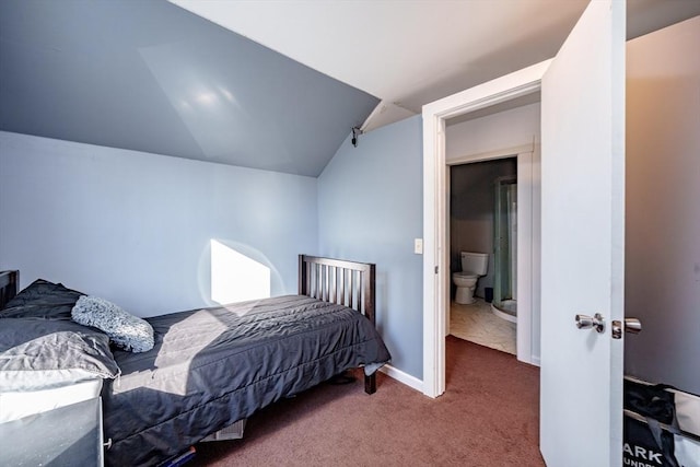 carpeted bedroom featuring vaulted ceiling