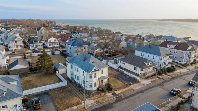 birds eye view of property with a residential view