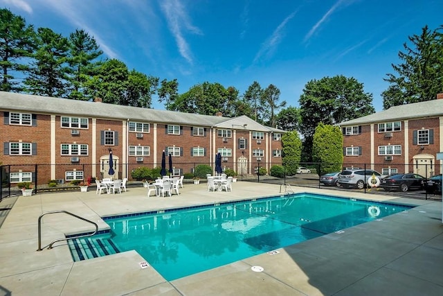 view of pool featuring a patio