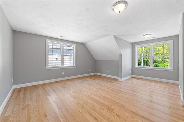 233 W Mountain St, Worcester, MA 01606 - bonus room with light wood-type flooring, baseboards, and lofted ceiling