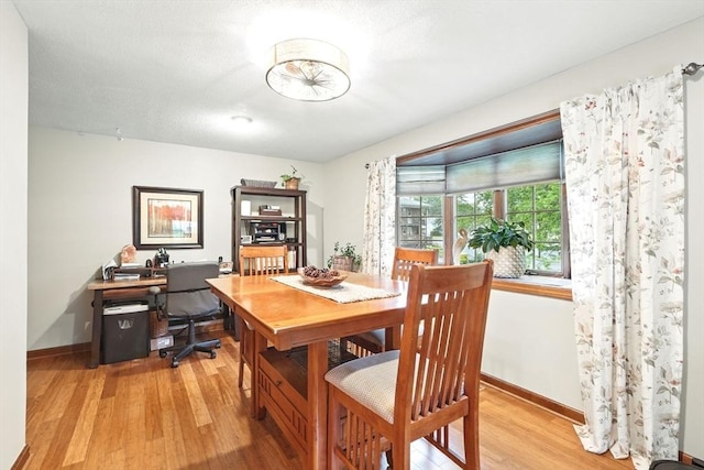 2 Pierce St, Agawam, MA 01030 - dining room with light wood-style floors and baseboards