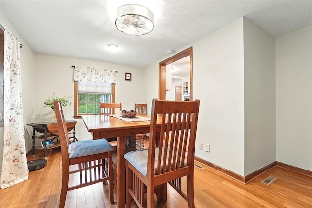 2 Pierce St, Agawam, MA 01030 - dining room featuring light wood-style floors and baseboards