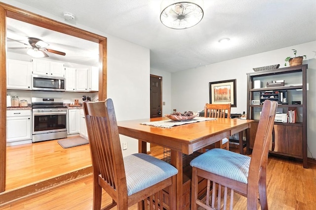 2 Pierce St, Agawam, MA 01030 - dining room with light wood finished floors and ceiling fan
