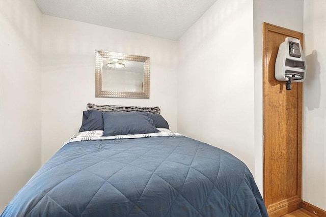 2 Pierce St, Agawam, MA 01030 - bedroom featuring wood finished floors and baseboards