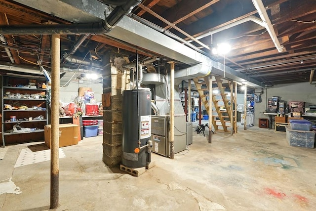 2 Pierce St, Agawam, MA 01030 - unfinished basement with water heater and heating unit