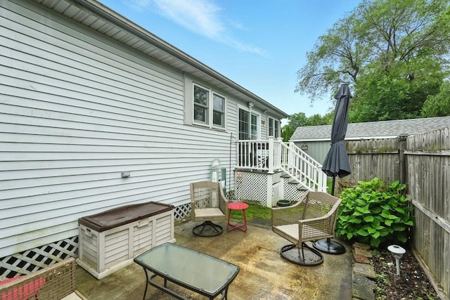 2 Pierce St, Agawam, MA 01030 - fenced backyard featuring a patio area
