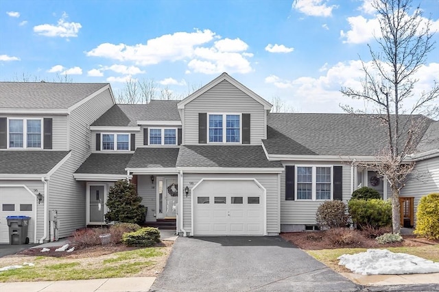 98 Caspian Way Unit 98, Fitchburg, MA 01420 - view of front of property with an attached garage, a shingled roof, and aphalt driveway