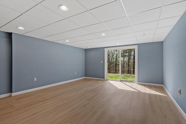 98 Caspian Way Unit 98, Fitchburg, MA 01420 - empty room featuring baseboards, wood finished floors, a drop ceiling, and recessed lighting