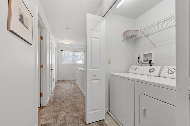 98 Caspian Way Unit 98, Fitchburg, MA 01420 - washroom with light colored carpet, washing machine and clothes dryer, laundry area, and baseboards