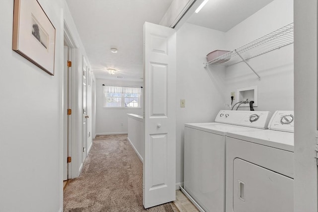 98 Caspian Way Unit 98, Fitchburg, MA 01420 - laundry room featuring light colored carpet, baseboards, separate washer and dryer, and laundry area