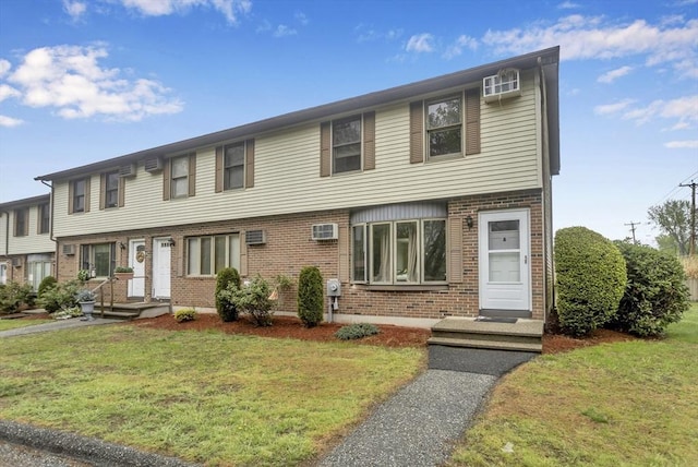 340 Dale St Unit A, Chicopee, MA 01020 - view of front of home featuring a front yard and brick siding