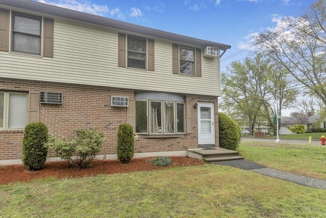 340 Dale St Unit A, Chicopee, MA 01020 - view of front of home featuring a front lawn and brick siding