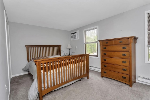 340 Dale St Unit A, Chicopee, MA 01020 - bedroom featuring carpet flooring, a baseboard radiator, and a wall unit AC