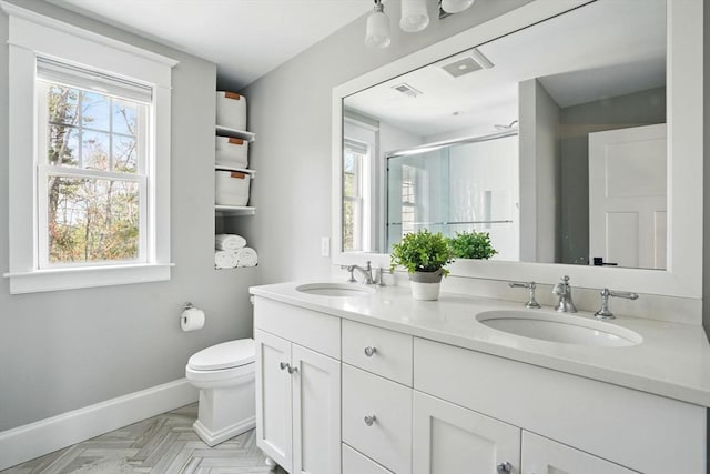 full bathroom featuring a sink, baseboards, toilet, and visible vents