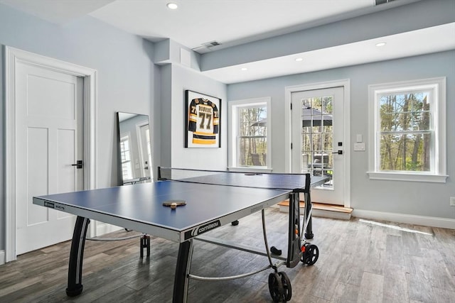 playroom with recessed lighting, baseboards, visible vents, and wood finished floors