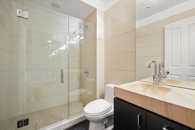 15 Marlborough St Unit 3, Boston, MA 02116 - bathroom with a shower stall, vanity, and tile walls