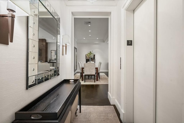 15 Marlborough St Unit 3, Boston, MA 02116 - hallway with ornamental molding, dark wood-style flooring, and recessed lighting