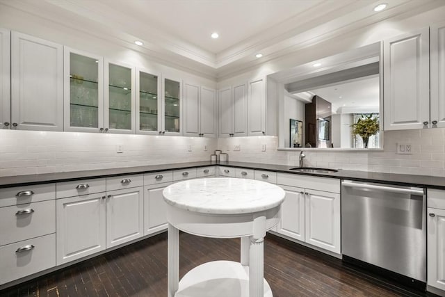 15 Marlborough St Unit 3, Boston, MA 02116 - kitchen featuring dishwasher, dark wood finished floors, white cabinetry, tasteful backsplash, and ornamental molding