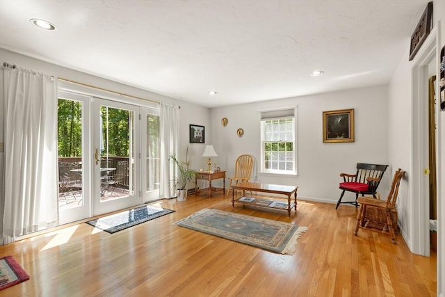 12 Robin Ln, Pepperell, MA 01463 - sitting room with plenty of natural light, wood finished floors, recessed lighting, and baseboards