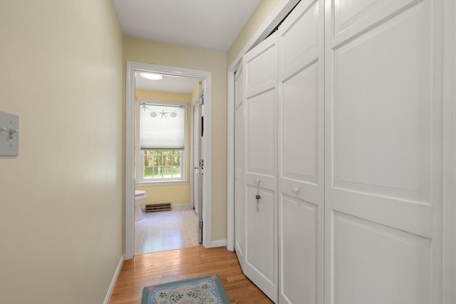 12 Robin Ln, Pepperell, MA 01463 - hallway with baseboards and light wood-style flooring