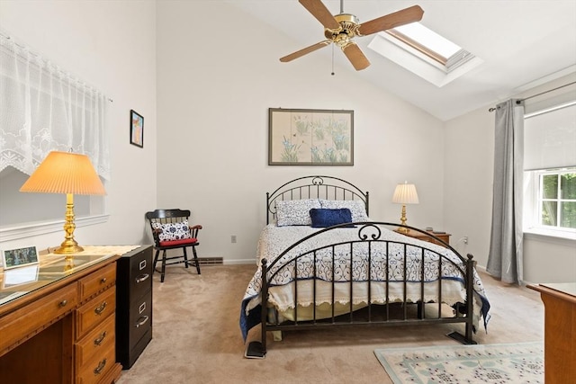 12 Robin Ln, Pepperell, MA 01463 - bedroom with lofted ceiling, a skylight, light colored carpet, and baseboards
