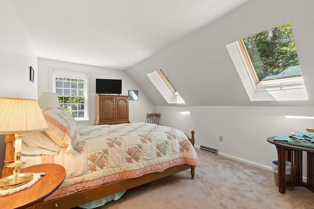 12 Robin Ln, Pepperell, MA 01463 - bedroom with a skylight, vaulted ceiling, carpet, and baseboards
